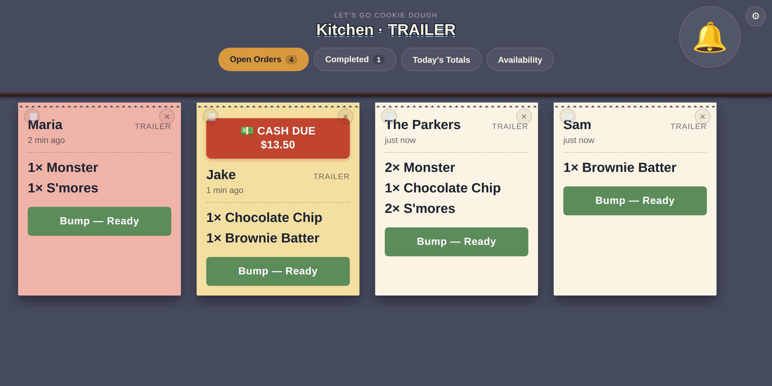 Kitchen screen with four open order tickets, one marked cash due